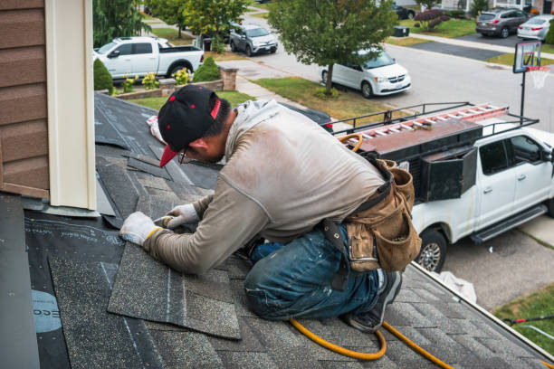 Professional Roofing technician working in Freedom, NH